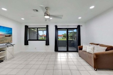 This beautifully renovated 3-bedroom, 2-bath townhome offers a - photo 5