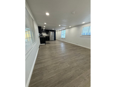 PRICE IMPROVED!!! This fully remodeled home offers comfort - photo 3