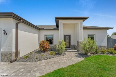 Beautiful 2023-built home in Cape Coral featuring impact windows - photo 1