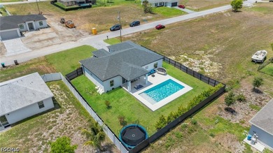 Beautiful 2023-built home in Cape Coral featuring impact windows - photo 3
