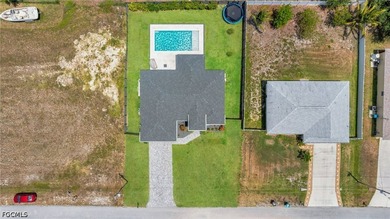 Beautiful 2023-built home in Cape Coral featuring impact windows - photo 4