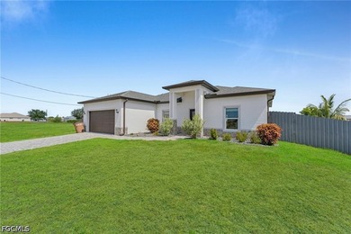 Beautiful 2023-built home in Cape Coral featuring impact windows - photo 6