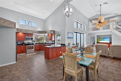 Stunning waterfront pool home with an expansive living area and - photo 6