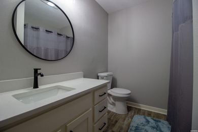 Catch a glimpse of Lake Hamilton from this charming upstairs - photo 24