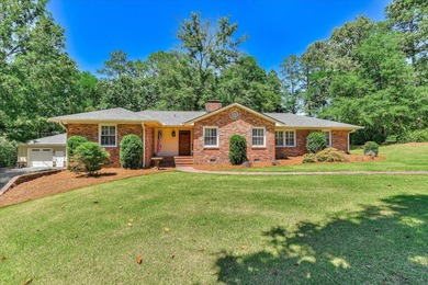 Nestled on just over an acre in a quiet, private setting near - photo 1