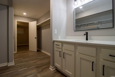 Catch a glimpse of Lake Hamilton from this charming upstairs - photo 32