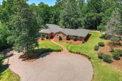 Nestled on just over an acre in a quiet, private setting near - photo 3