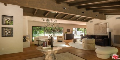 Tucked behind gates in prime Encino, this warm organic-modern - photo 6