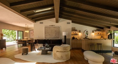 Tucked behind gates in prime Encino, this warm organic-modern - photo 7