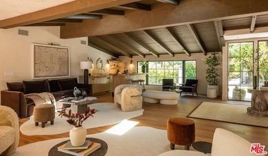 Tucked behind gates in prime Encino, this warm organic-modern - photo 8