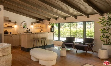 Tucked behind gates in prime Encino, this warm organic-modern - photo 9