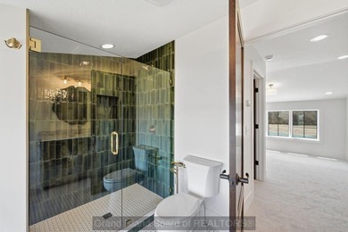 Experience elevated lake living in this stunning new Oseka home - photo 46