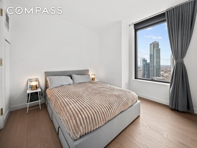 This high-floor, northeast-facing one-bedroom apartment offers a - photo 7