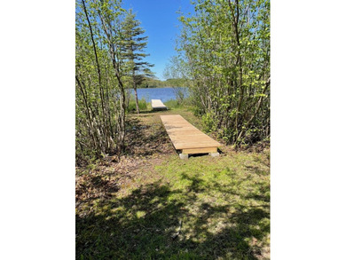 Nestled along the crystal-clear shores of Williams Lake, this - photo 10