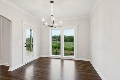 BACKING TO GREEN SPACE WITH LAKE VIEW. Approximately 60 days to - photo 22