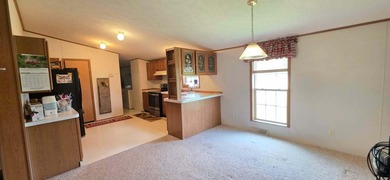 Nestled on 8 beautiful acres in Eubank, Kentucky, this charming - photo 13