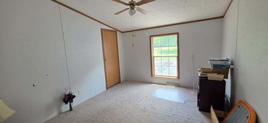 Nestled on 8 beautiful acres in Eubank, Kentucky, this charming - photo 20