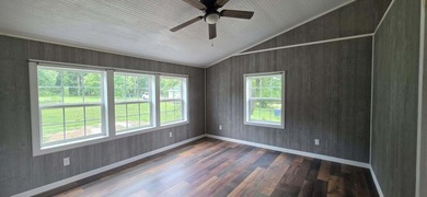 Nestled on 8 beautiful acres in Eubank, Kentucky, this charming - photo 23