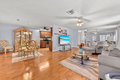 Cypress Lakes is a gated 55+ community featuring a - photo 6