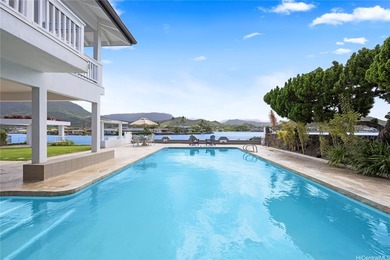 Set along the peaceful shoreline of a tranquil lake, this - photo 15