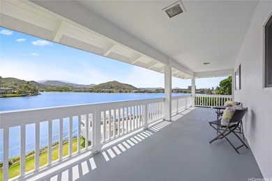 Set along the peaceful shoreline of a tranquil lake, this - photo 20