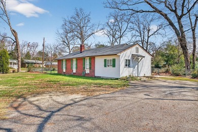 An investor's dream! Brick, ranch home located across the street - photo 1