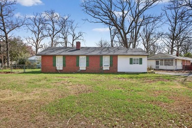 An investor's dream! Brick, ranch home located across the street - photo 2