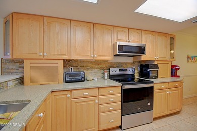 Beachside living with golf course AND Halifax River views in