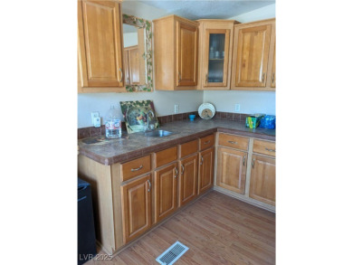 Upscale 2005 triple-wide sits on a quiet cul-de-sac in north