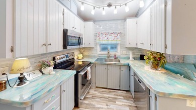 This single-story home is in Reflections On Silver Lake (55+ - photo 16