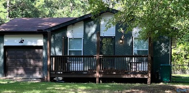 Newly remodeled 3-bedroom 2-bath home just across the road from - photo 2