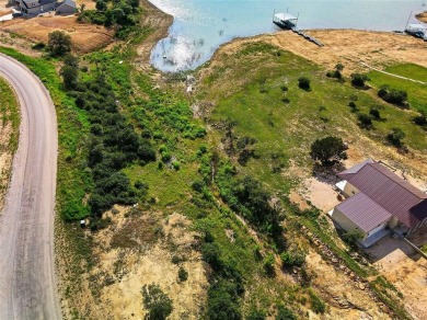 Build your home away from home on the banks of Lot 11 in the - photo 2