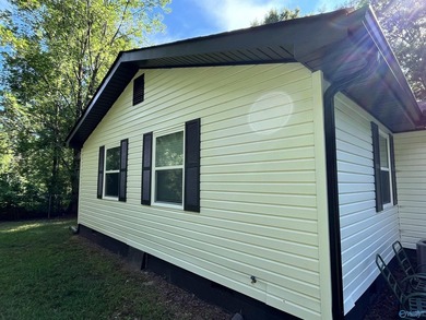 Newly remodeled 3-bedroom 2-bath home just across the road from - photo 3