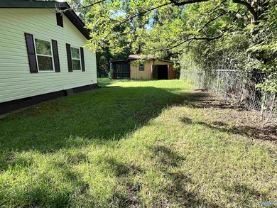 Newly remodeled 3-bedroom 2-bath home just across the road from - photo 4