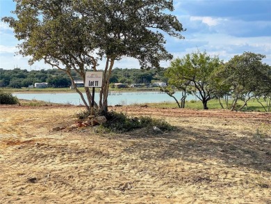 Build your home away from home on the banks of Lot 11 in the - photo 4