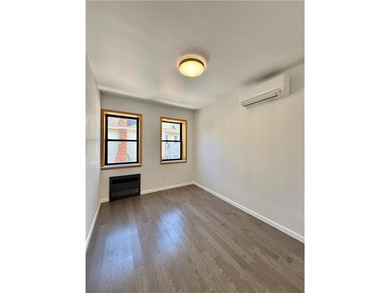 Beautifully renovated semi-detached two-family home on a 25' x - photo 33