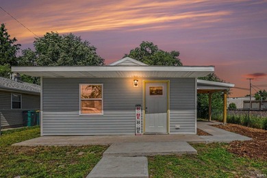 Welcome home to this beautifully remodeled 3-bedroom, 2-bath gem - photo 1