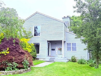 Experience timeless elegance in this impressive 5 bedroom, 2.5 - photo 1