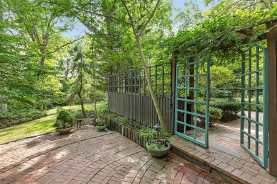 *A Peaceful Retreat Among the Trees.* Designed to embrace its - photo 1