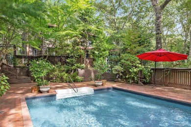 *A Peaceful Retreat Among the Trees.* Designed to embrace its - photo 3