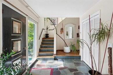 *A Peaceful Retreat Among the Trees.* Designed to embrace its - photo 4