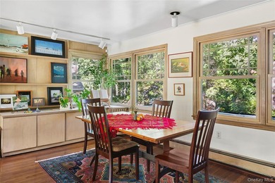 *A Peaceful Retreat Among the Trees.* Designed to embrace its - photo 7