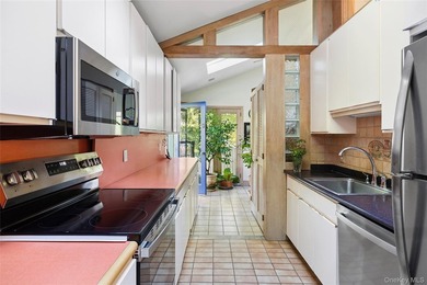 *A Peaceful Retreat Among the Trees.* Designed to embrace its - photo 8