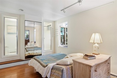 *A Peaceful Retreat Among the Trees.* Designed to embrace its - photo 10