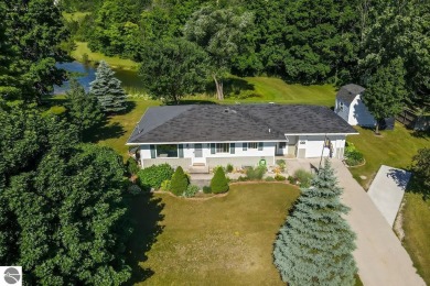 (private lake, pond, creek) Home For Sale in Ellsworth Michigan