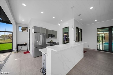 This custom-designed home offers exceptional craftsmanship and a - photo 44