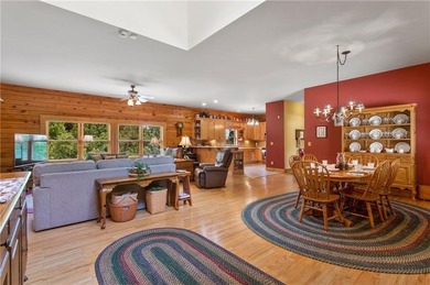 Welcome home to this custom builder's retreat with metal roof &