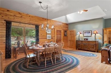 Welcome home to this custom builder's retreat with metal roof &