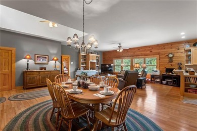 Welcome home to this custom builder's retreat with metal roof &