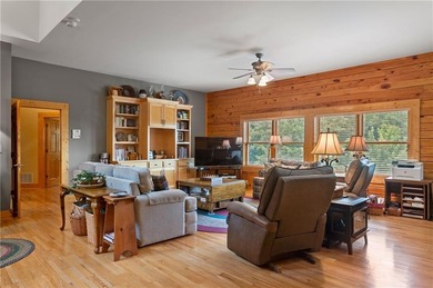 Welcome home to this custom builder's retreat with metal roof &